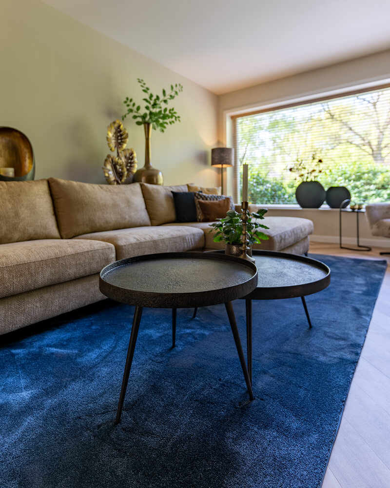 2 zwarte ronde salontafels